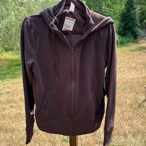 New with tags brown zip hoodie with super soft lining.